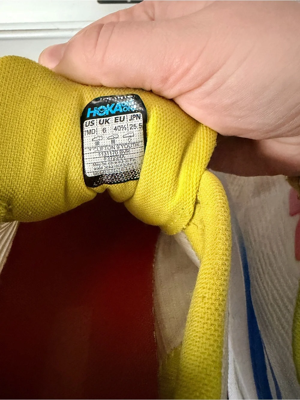 Hoka Yellow and White Running Shoes with Blue Logo Accent